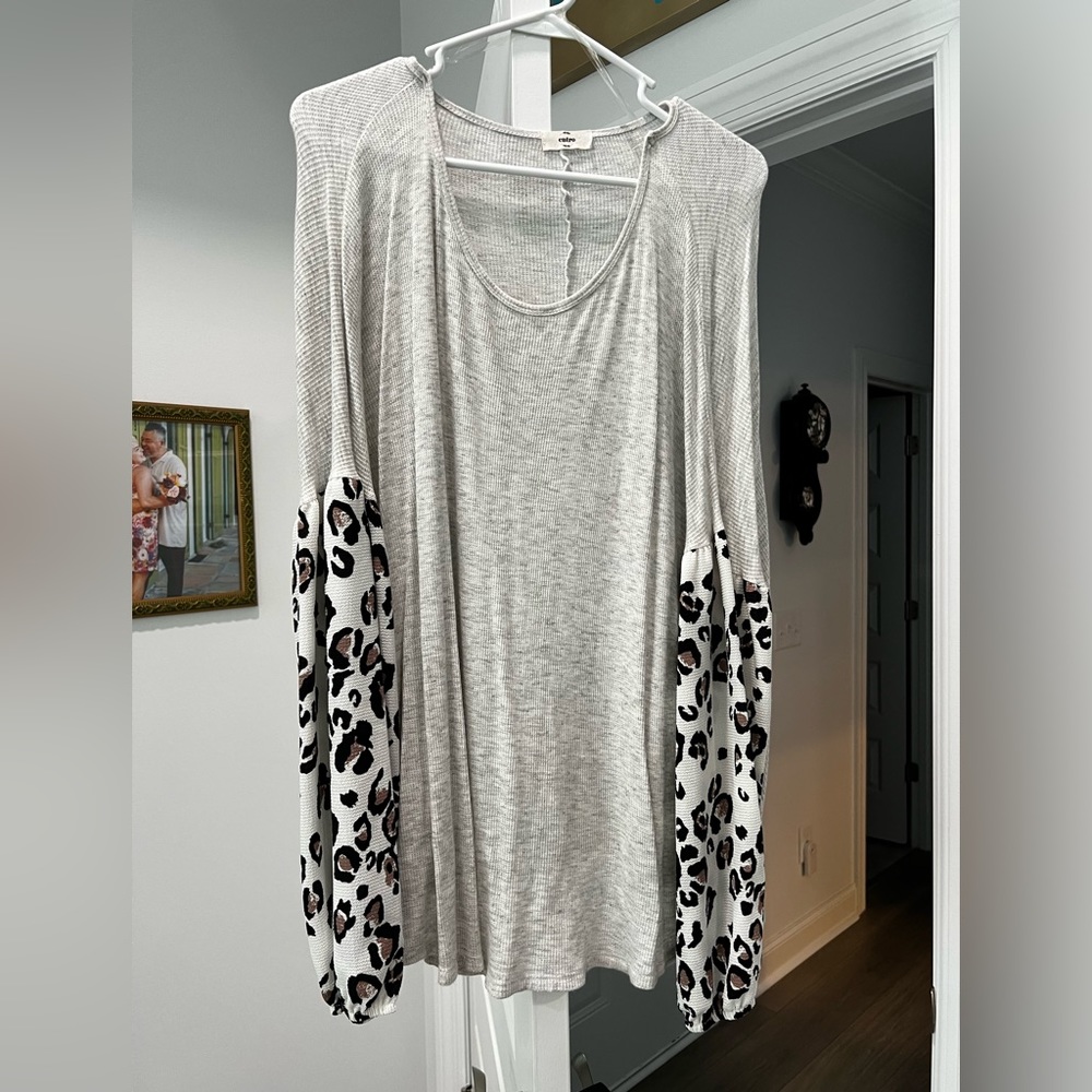 Henley style pullover in a light gray